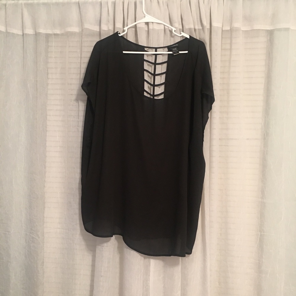 Black blouse with cross detailing in back
